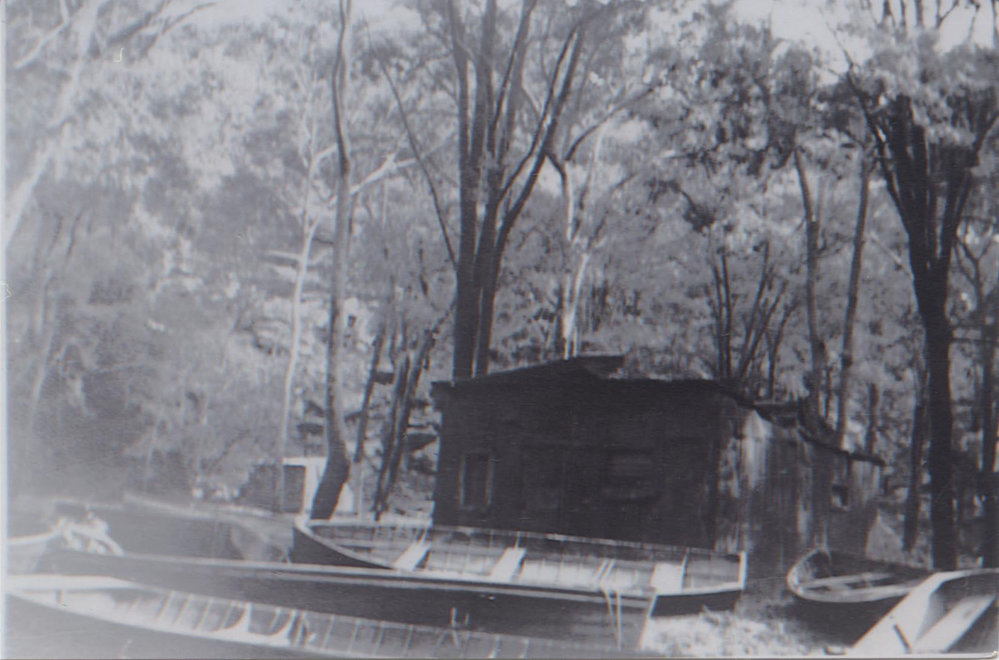 Storm damaged boats at Harry Bellamy's shack