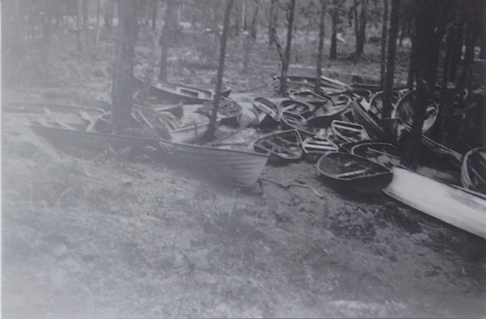 Storm damaged boats on Wright's Flat, Crosslands 1942