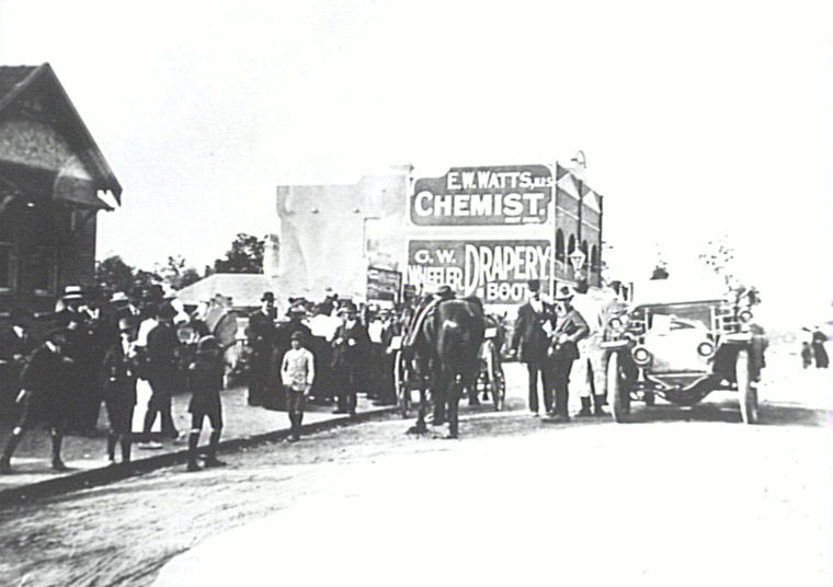 Epping looking north, showing E.W. Watts Chemist and Wheeler's Drapery