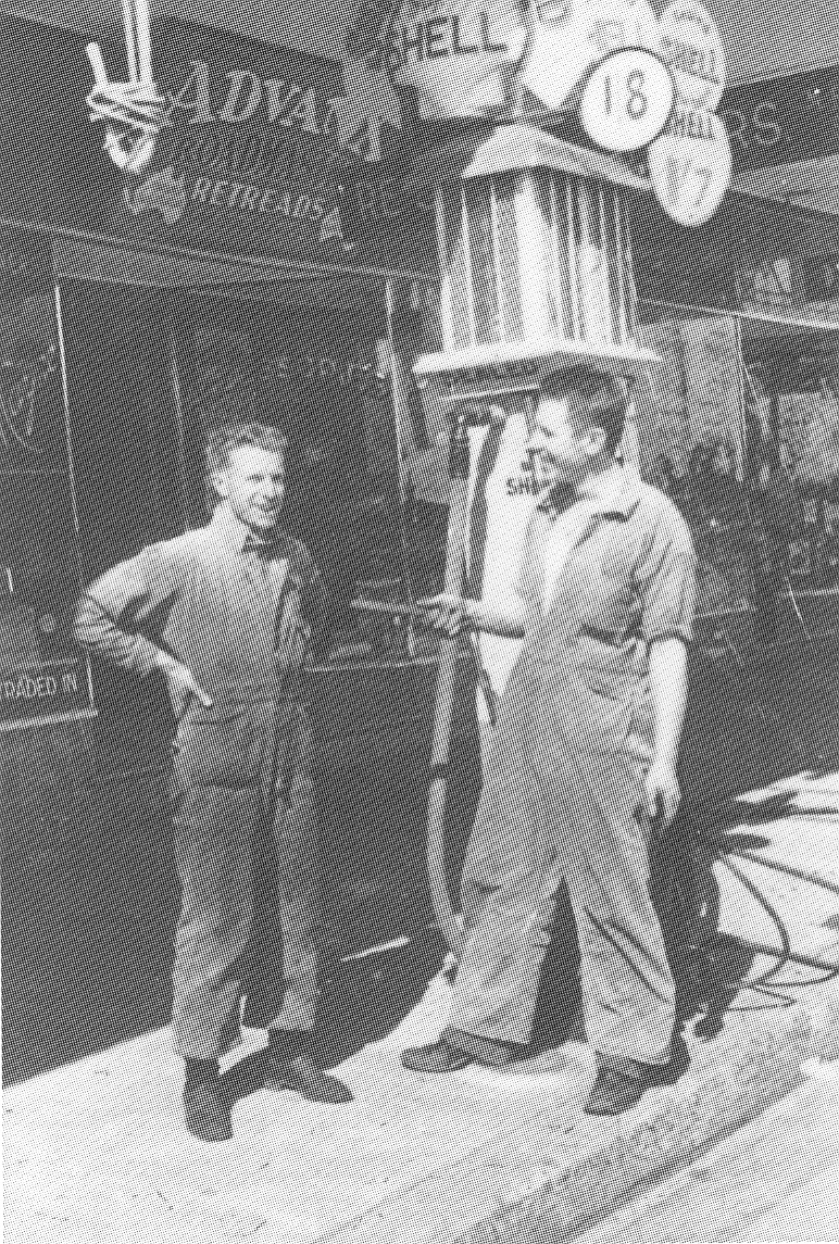 Arthur Moxon and John Pill outside Pipers Sports Store, Langston Place, Epping, c. 1934