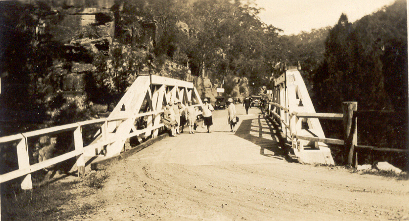 Galston Gorge, walkers crossing McDonald truss bridge, c 1920s
