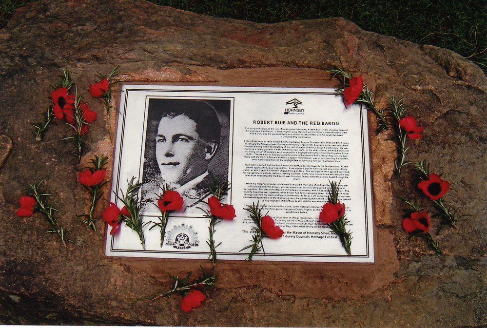 Plaquing of memorial to Robert Buie and the Red Baron