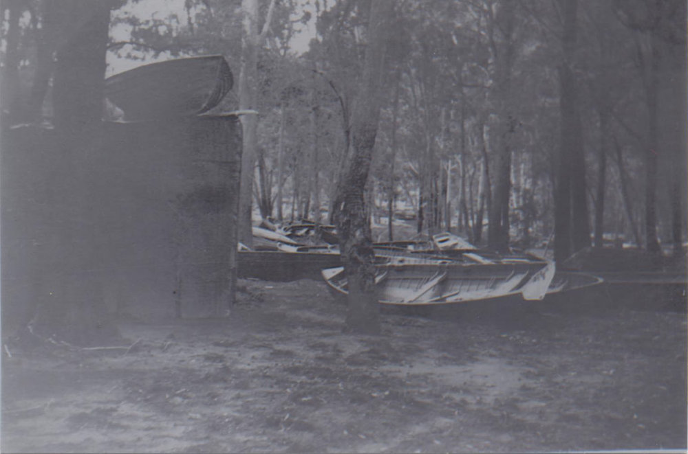 Damaged boats at Harry Bellamy's Shack, Crosslands 1942
