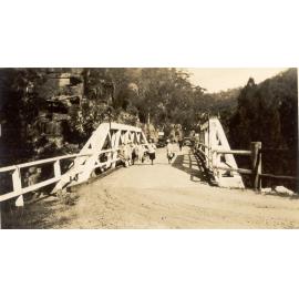 Galston Gorge, walkers crossing McDonald truss bridge, c 1920s
