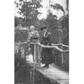 Sir Edgeworth David and Caroline David on the bridge at 'Coringbah', Hornsby, c. 1930