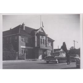 Funeral proccession passing Hornsby Shire Fire Station, 1950s