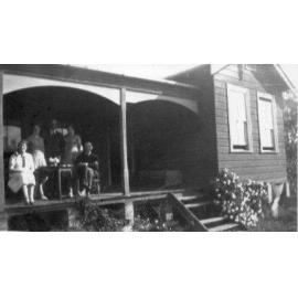 Moody family on verandah of their house in Hull Rd, Pennant Hills