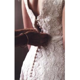 Lace wedding dress created by Heather Payne