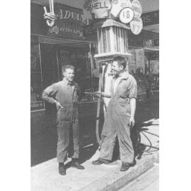 Arthur Moxon and John Pill outside Pipers Sports Store, Langston Place, Epping, c. 1934