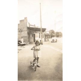 Girl on scooter, Pacific Highway, Hornsby