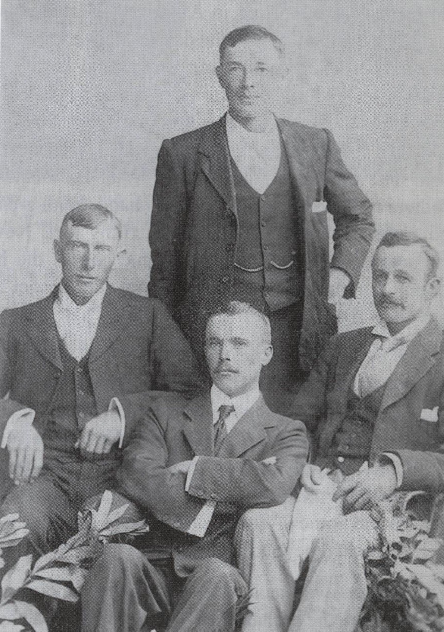 The sons of William and Ellen Stokes. William (left), Fred (standing), Alf (centre) and Walter (right) in 1892.